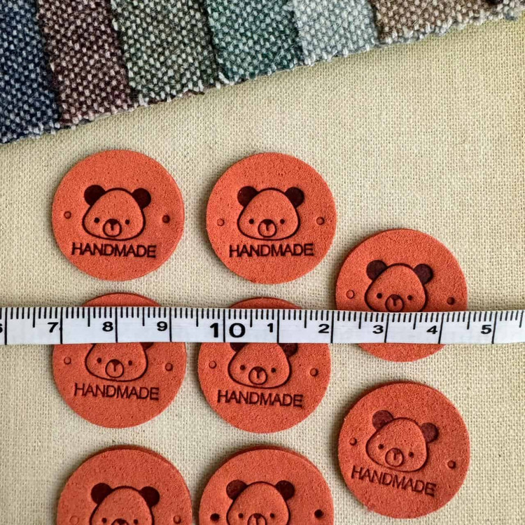 Бирка Hand Made из П/У кожи d25мм цвет Медный